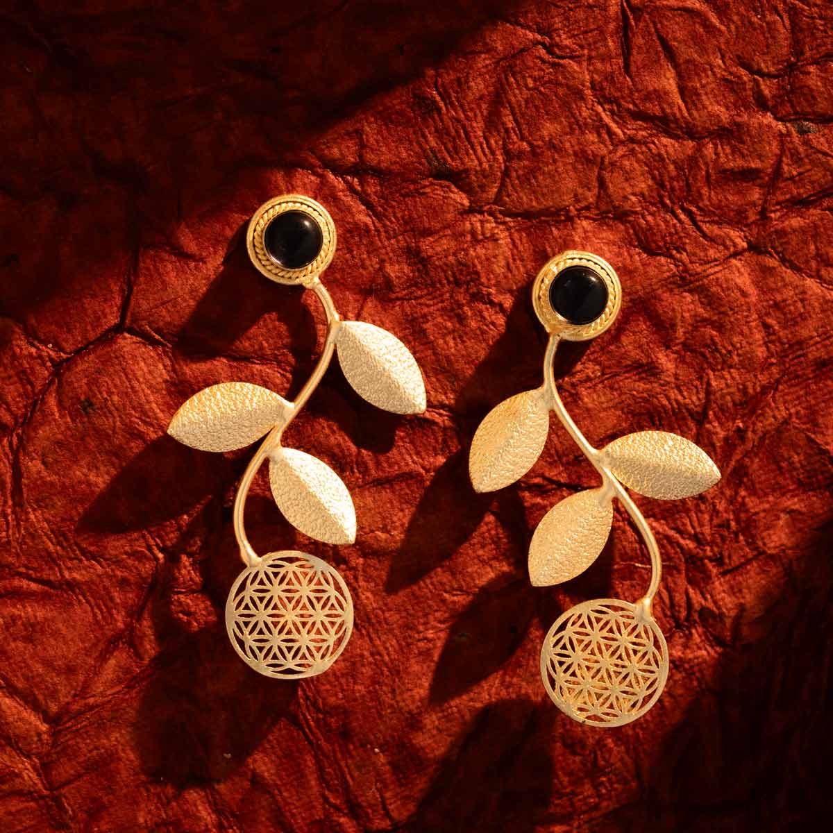 Gold-Plated Leaf Drop Earrings with Black Stone Accent